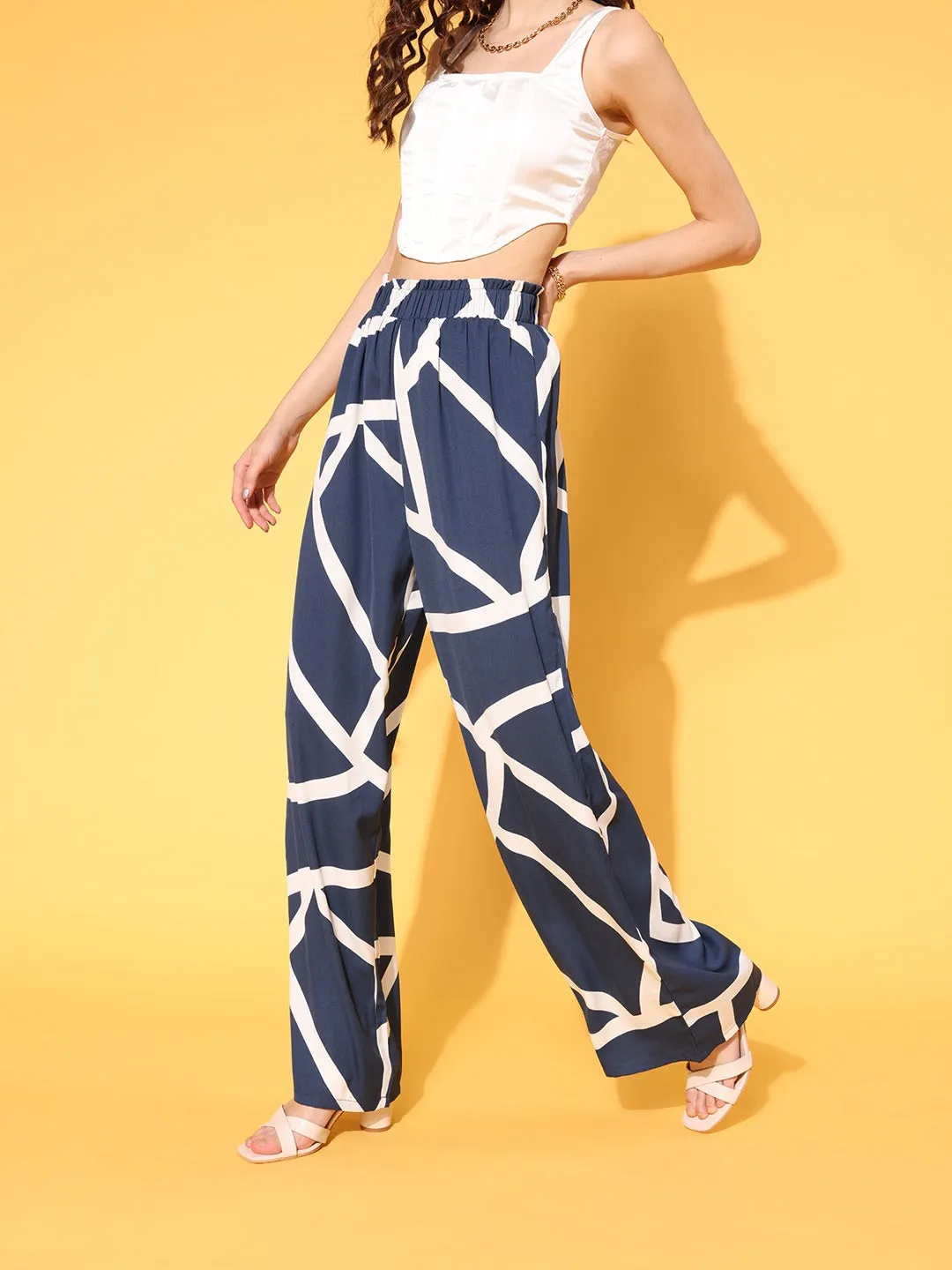 Berrylush Women Navy Blue & White Geometric Printed High-Rise Elastic Waist Pleated Trousers